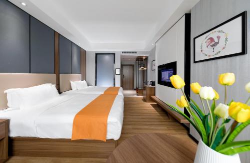 Imagen de la habitación del Hotel Morninginn, Qingyuan Gulong Gorge Wanda Plaza. Foto 7