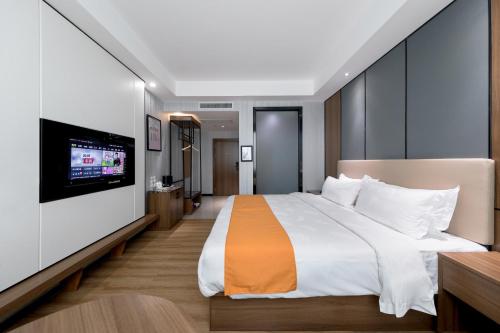 Imagen de la habitación del Hotel Morninginn, Qingyuan Gulong Gorge Wanda Plaza. Foto 9
