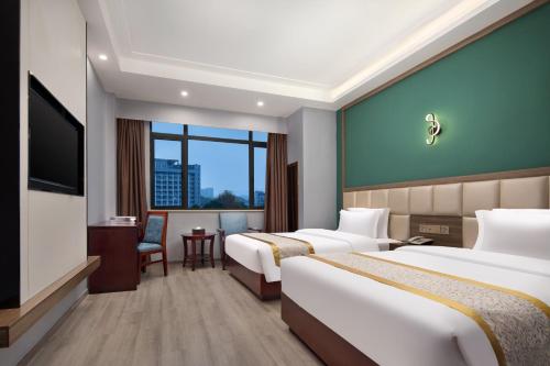 Imagen de la habitación del Hotel Morninginn, Xingsha Huiyi City. Foto 9