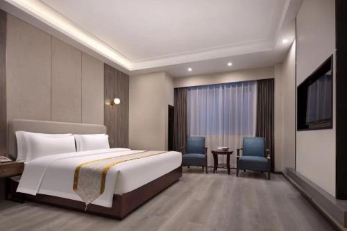 Imagen de la habitación del Hotel Morninginn, Xingsha Huiyi City. Foto 10