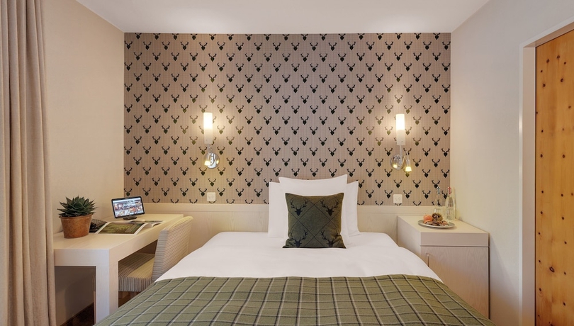 Imagen de la habitación del Hotel Morosani Posthotel Davos. Foto 12