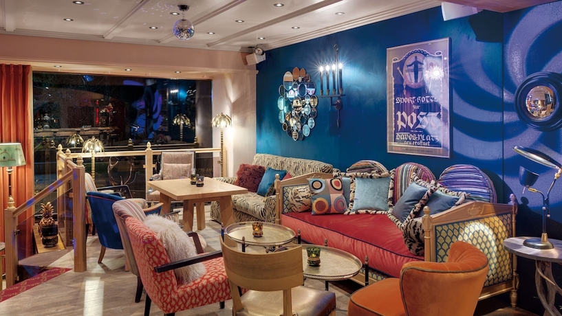 Imagen del bar/restaurante del Hotel Morosani Posthotel Davos. Foto 2