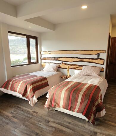 Imagen de la habitación del Hotel Morrena Lodge. Foto 14