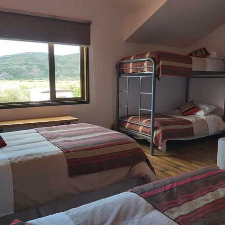 Imagen de la habitación del Hotel Morrena Lodge. Foto 16