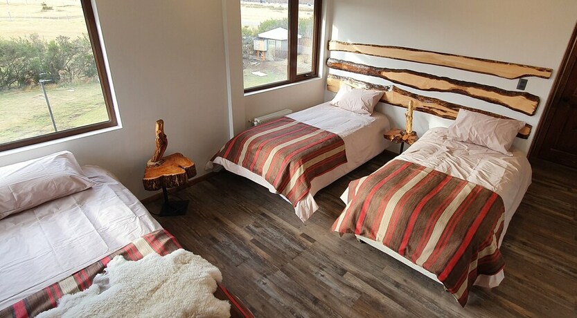 Imagen de la habitación del Hotel Morrena Lodge. Foto 18