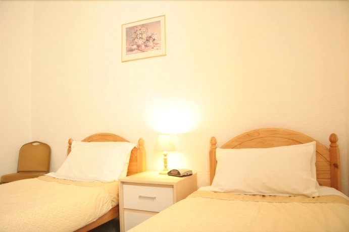 Imagen de la habitación del Hotel Morrisy House. Foto 7
