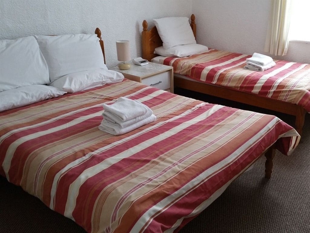 Imagen de la habitación del Hotel Morrisy House. Foto 14