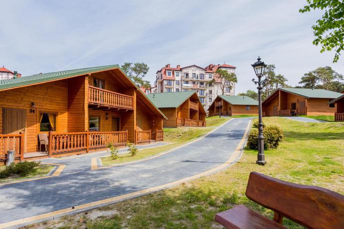 Imagen de los exteriores del Hotel Morska Osada domki blisko Morza. Foto 4