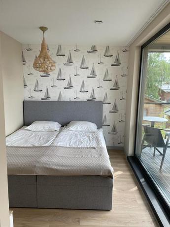 Imagen de la habitación del Hotel Morska Osada domki blisko Morza. Foto 3
