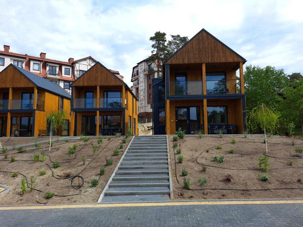 Imagen de los exteriores del Hotel Morska Osada domki blisko Morza. Foto 5