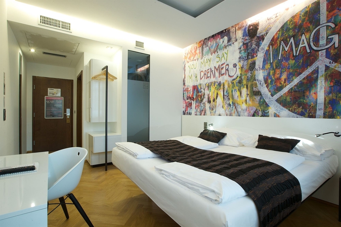 Imagen de la habitación del Hotel Mosaic House Design. Foto 2