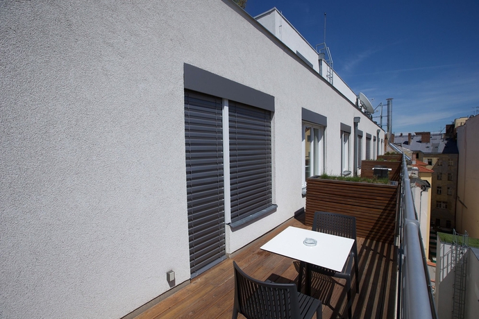 Imagen de la habitación del Hotel Mosaic House Design. Foto 5