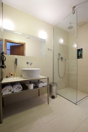 Imagen de la habitación del Hotel Mosaic House Design. Foto 8