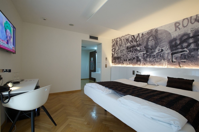 Imagen de la habitación del Hotel Mosaic House Design. Foto 9