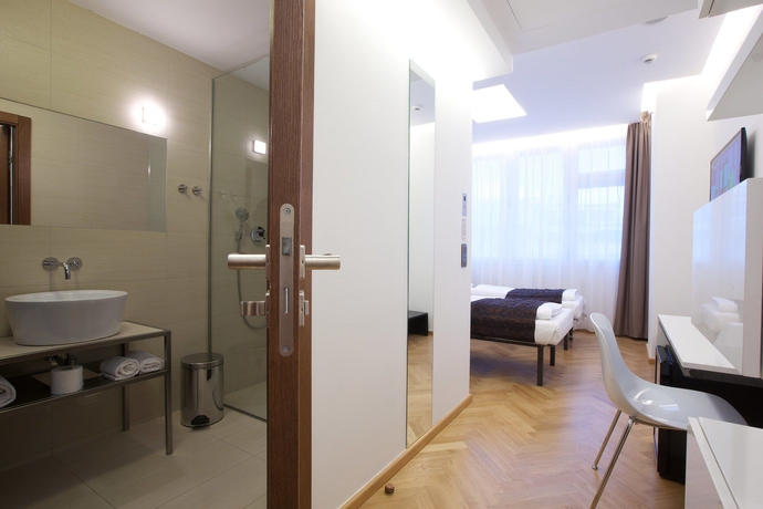 Imagen de la habitación del Hotel Mosaic House Design. Foto 13