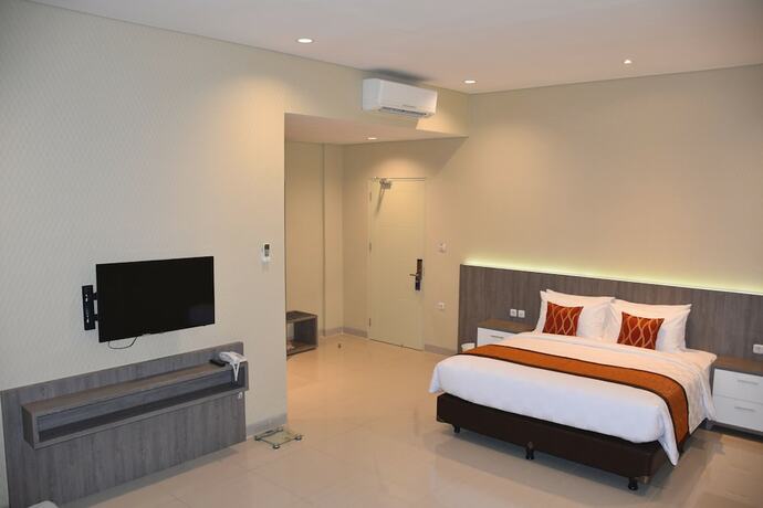 Imagen de la habitación del Hotel Moscha Surabaya City Center. Foto 17