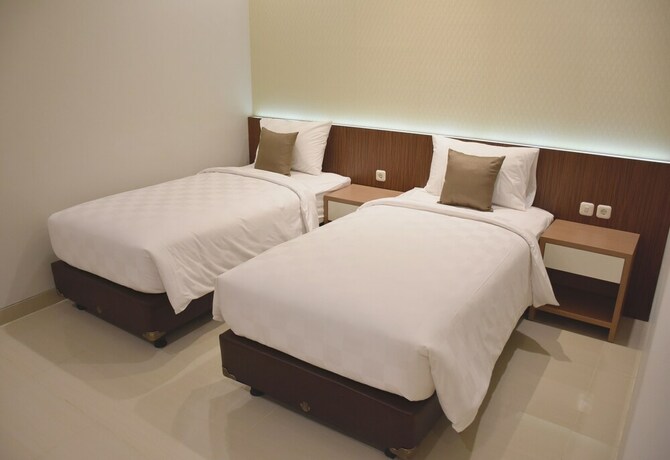 Imagen de la habitación del Hotel Moscha Surabaya City Center. Foto 18