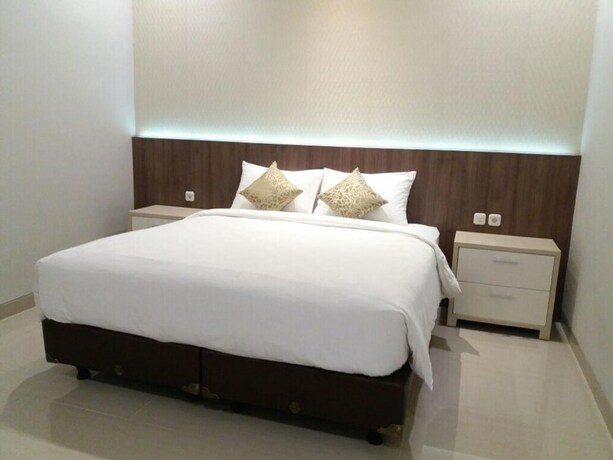 Imagen de la habitación del Hotel Moscha Surabaya City Center. Foto 19