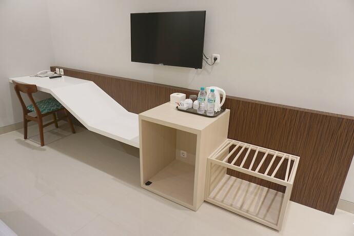 Imagen de la habitación del Hotel Moscha Surabaya City Center. Foto 22