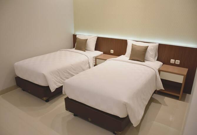 Imagen de la habitación del Hotel Moscha Surabaya City Center. Foto 25