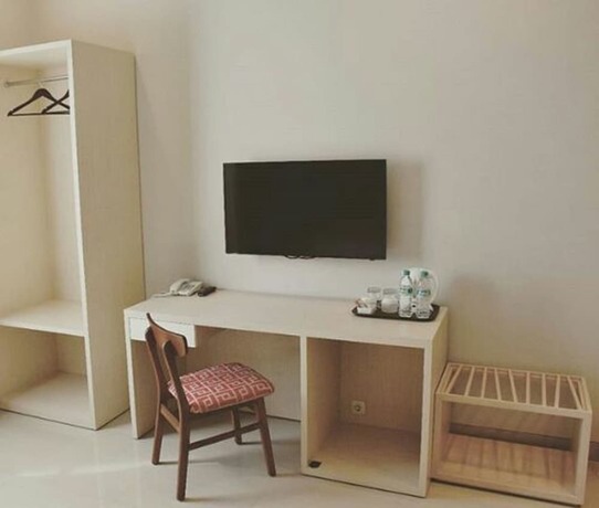 Imagen de la habitación del Hotel Moscha Surabaya City Center. Foto 27