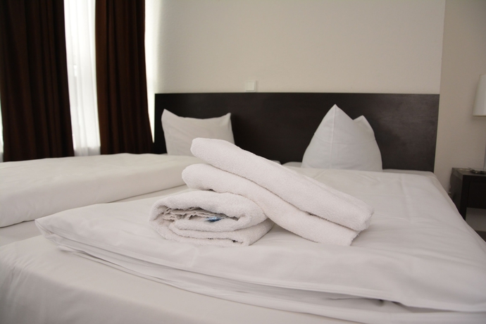 Imagen de la habitación del Hotel Mosel Frankfurt. Foto 10