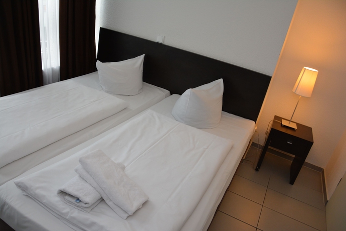 Imagen de la habitación del Hotel Mosel Frankfurt. Foto 11