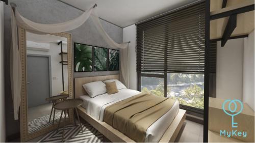 Imagen de la habitación del Hotel Mossaz Suites by Mykey Global. Foto 16