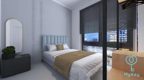 Imagen de la habitación del Hotel Mossaz Suites by Mykey Global. Foto 18