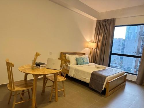 Imagen de la habitación del Hotel Mossaz Suites by Mykey Global. Foto 20