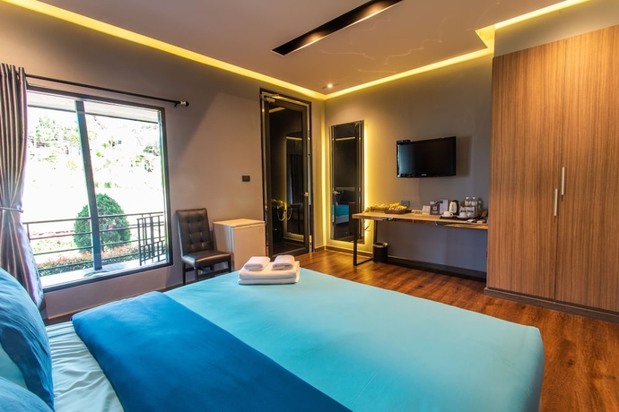 Imagen de la habitación del Hotel Mossview Resort. Foto 11