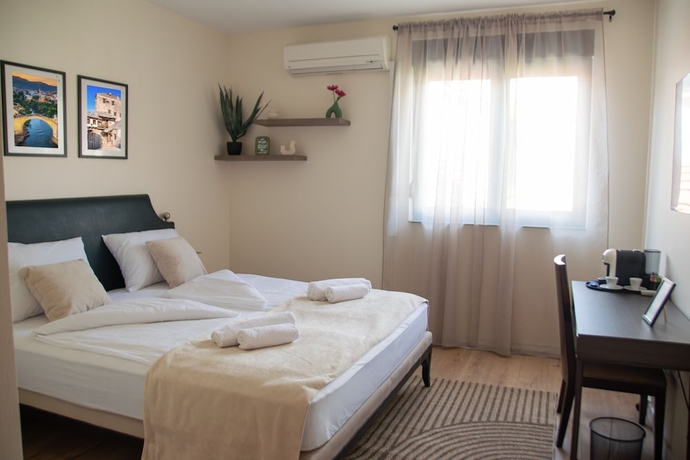 Imagen de la habitación del Hotel Mostay Boutique. Foto 11