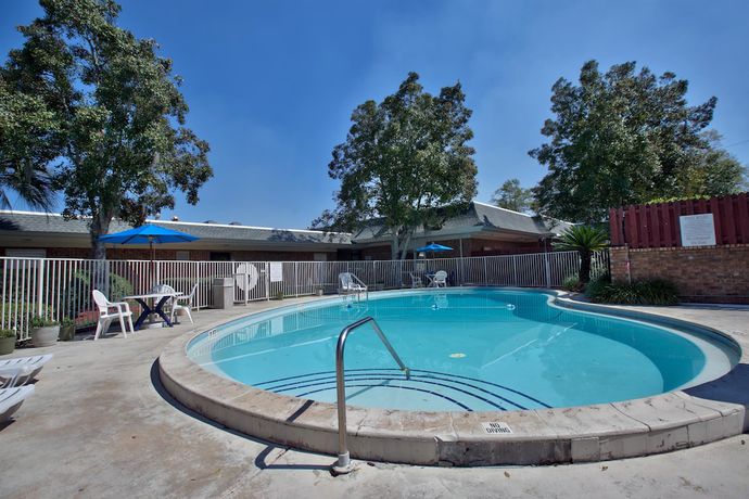 Imagen de la piscina del Hotel Motel 6 Tallahassee, FL - Downtown. Foto 19