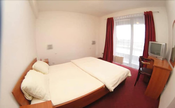 Imagen de la habitación del Hotel Motel Bella Italia. Foto 15