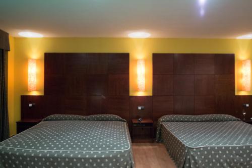 Imagen de la habitación del Hotel Motel Emporio. Foto 18