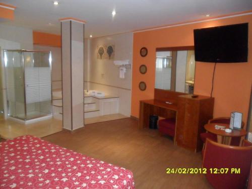 Imagen de la habitación del Hotel Motel Emporio. Foto 20