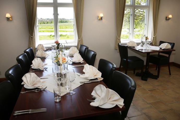 Imagen del bar/restaurante del Hotel Motel H&oslash;jm&oslash;lle Kro. Foto 4