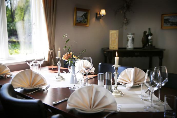 Imagen del bar/restaurante del Hotel Motel H&oslash;jm&oslash;lle Kro. Foto 7