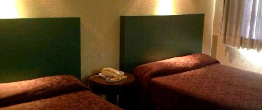 Imagen de la habitación del Hotel Motel La Fortuna. Foto 11