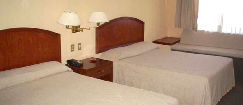 Imagen de la habitación del Hotel Motel La Fortuna. Foto 12