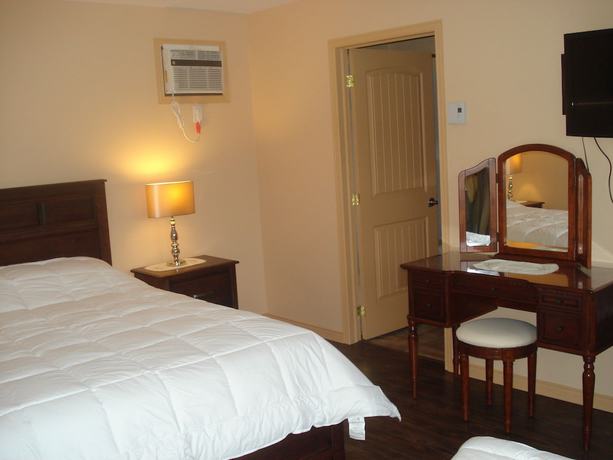 Imagen de la habitación del Hotel Motel La Maison de Travers. Foto 2