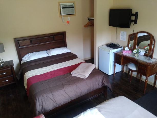 Imagen de la habitación del Hotel Motel La Maison de Travers. Foto 9