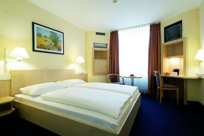 Imagen de la habitación del Hotel Motel One Frankfurt-Hauptbahnhof. Foto 9