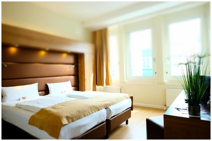 Imagen de la habitación del Hotel Motel Plus Berlin. Foto 5