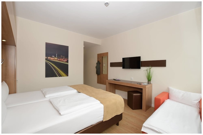 Imagen de la habitación del Hotel Motel Plus Berlin. Foto 8