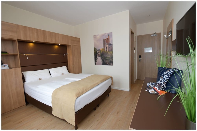 Imagen de la habitación del Hotel Motel Plus Berlin. Foto 11