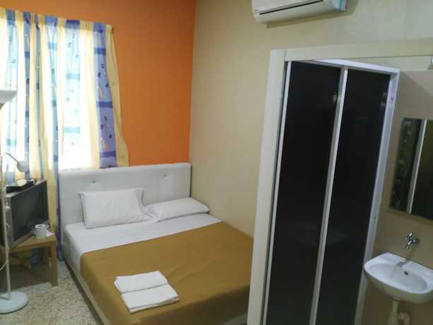 Imagen de la habitación del Hotel Motel TwoU. Foto 9