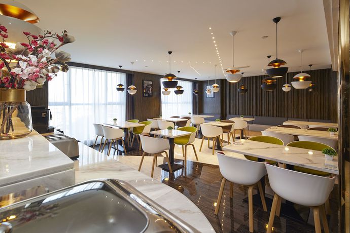 Imagen del bar/restaurante del Hotel Motel Yangzhou the Slender West Lake. Foto 2
