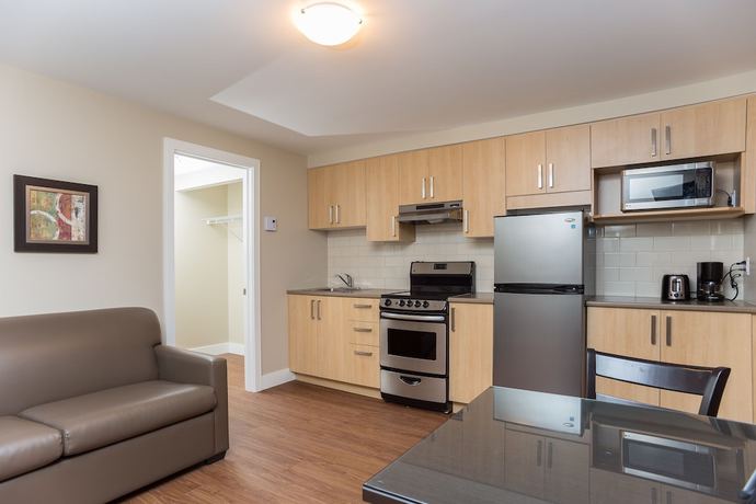 Imagen de la habitación del Hotel Motel et Appartements du Fleuve. Foto 11