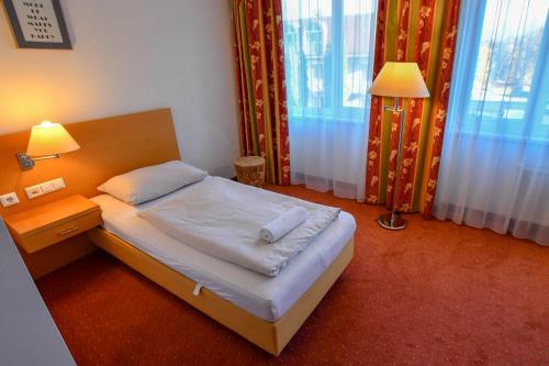Imagen de la habitación del Hotel Motel55 - nettes mit Self Check-In in Villach, Warmbad. Foto 18